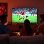 A vibrant screen showing a live football match on a device, symbolizing footy streams and online sports streaming.